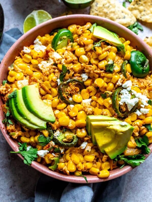 An image of Mexican street corn casserole in a serving bowl.