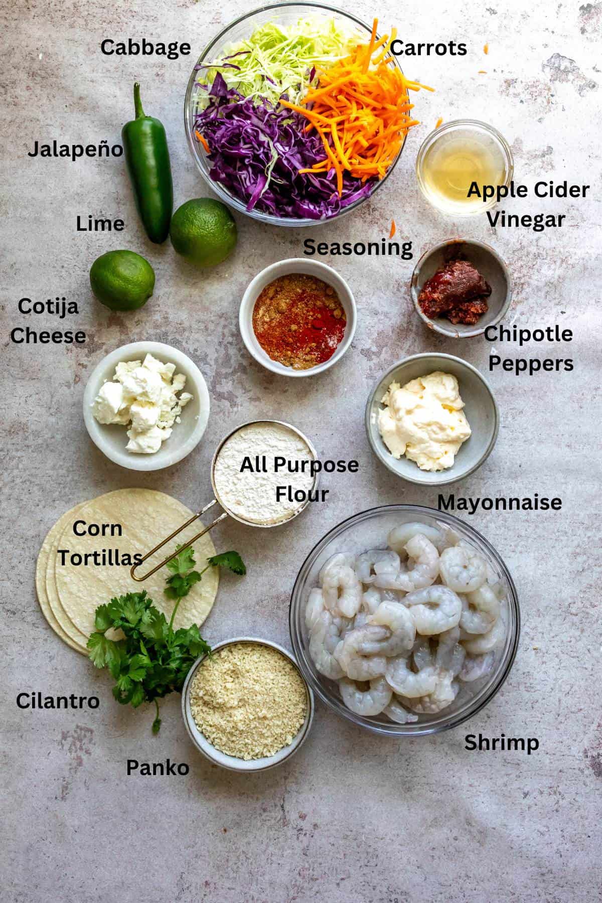Overhead photo of bowls and small plates showing the ingredients for the recipe. 
