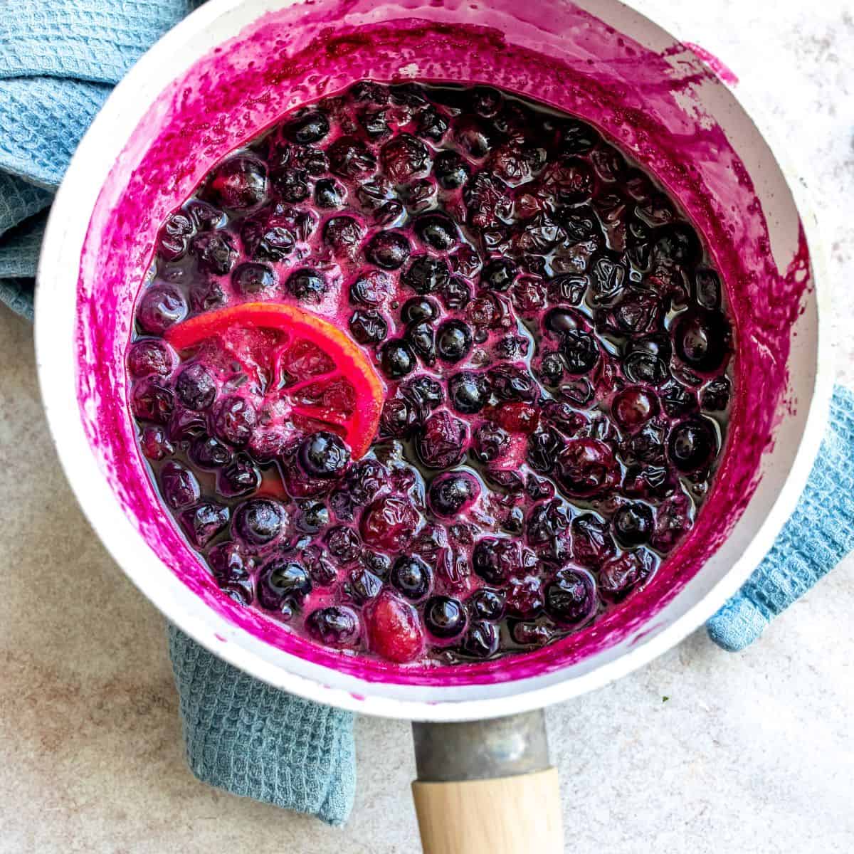 An image of blueberry syrup in a saucepan.