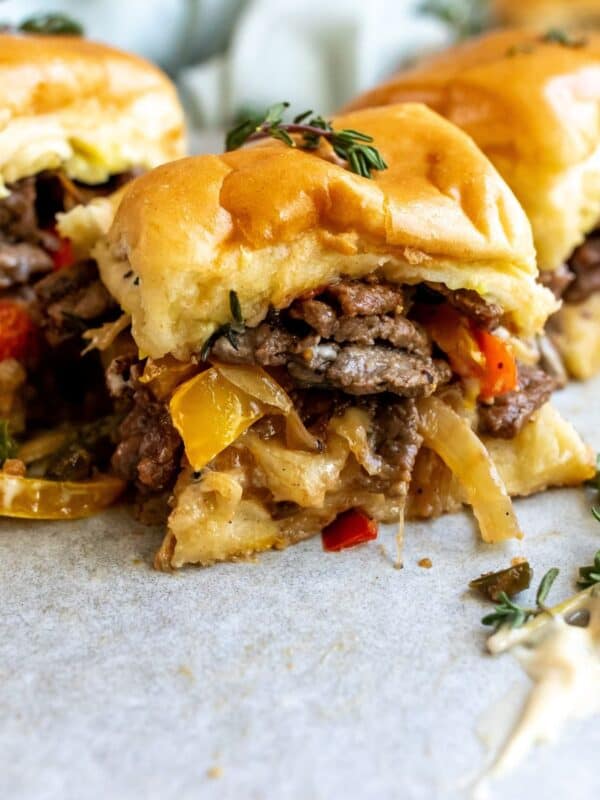 An image of philly cheesesteak sliders.