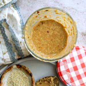 Jar with creamy roasted sesame dressing.