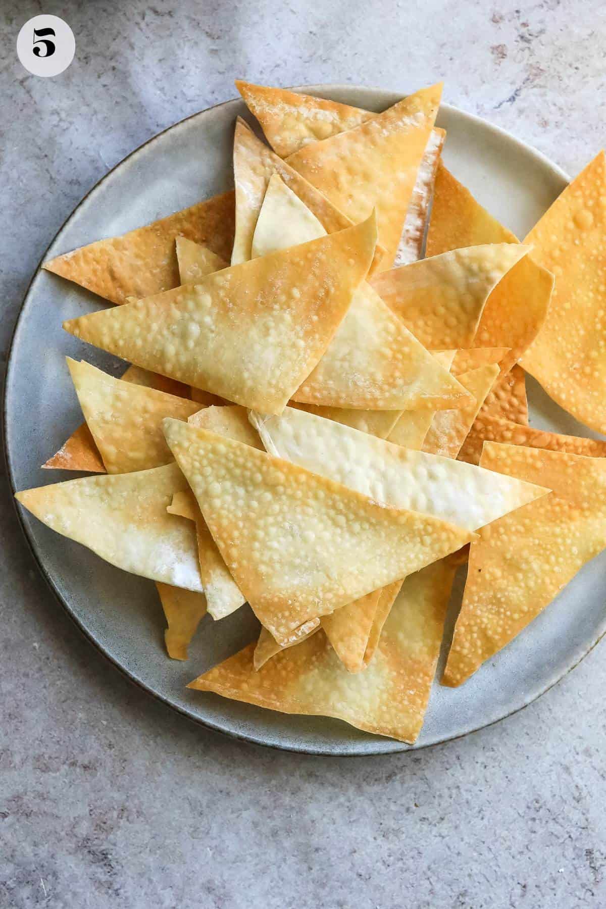 Wonton chips on a plate. 