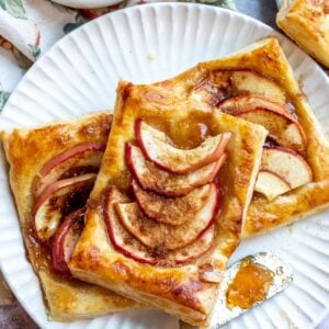 An image of apple tarts on a plate.