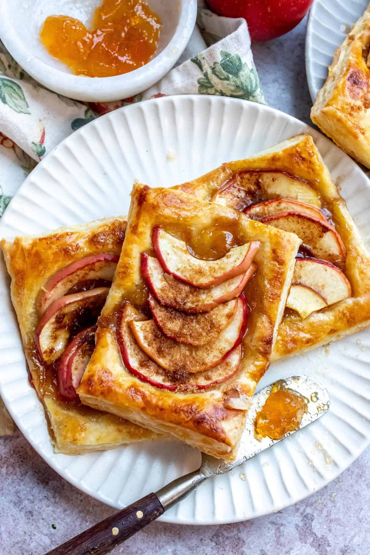 An image of apple tarts on a plate.