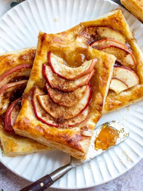 An image of apple tarts on a plate.