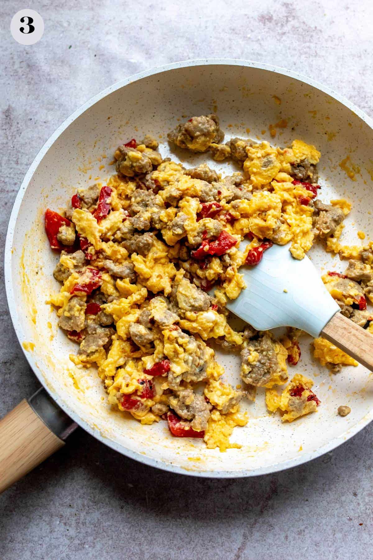 An image of turkey sausage being cooked on a skillet.