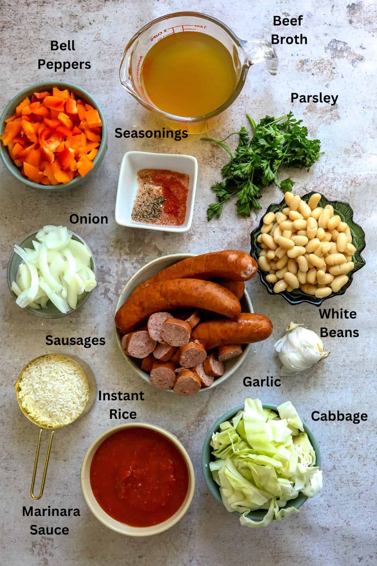 Ingredients needed to make this recipe on a counter in bowls and cups. 