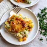 An image of a slice of chicken cobbler on a plate.