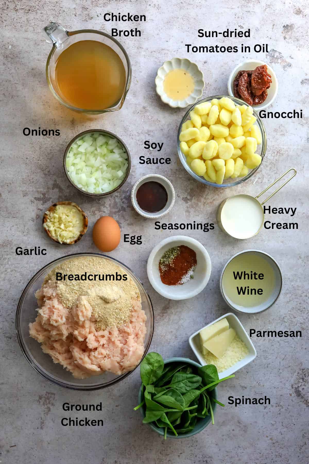 Ingredients to make this meal on a counter in small bowls and measuring cups. 