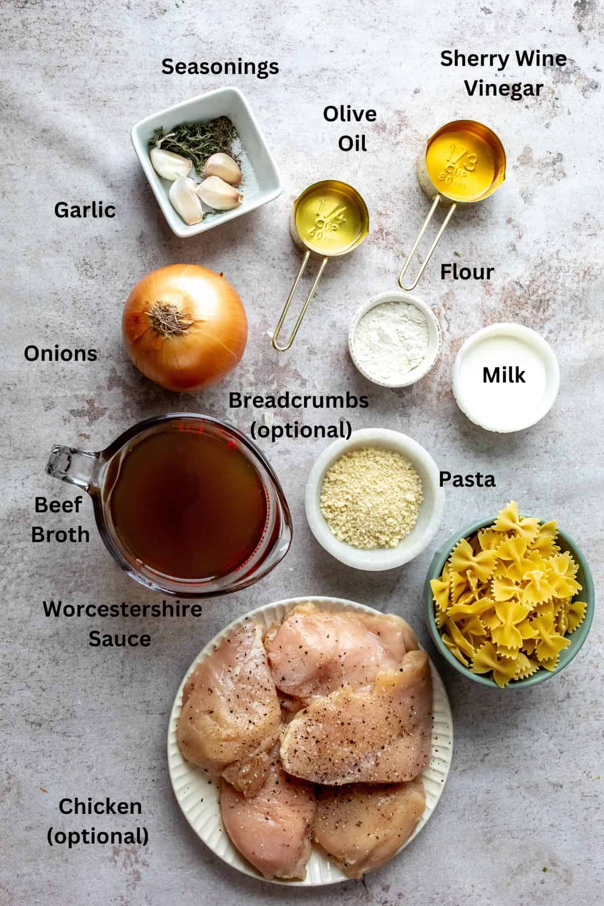 All ingredients needed to make the recipe in small bowls and measuring cups. 