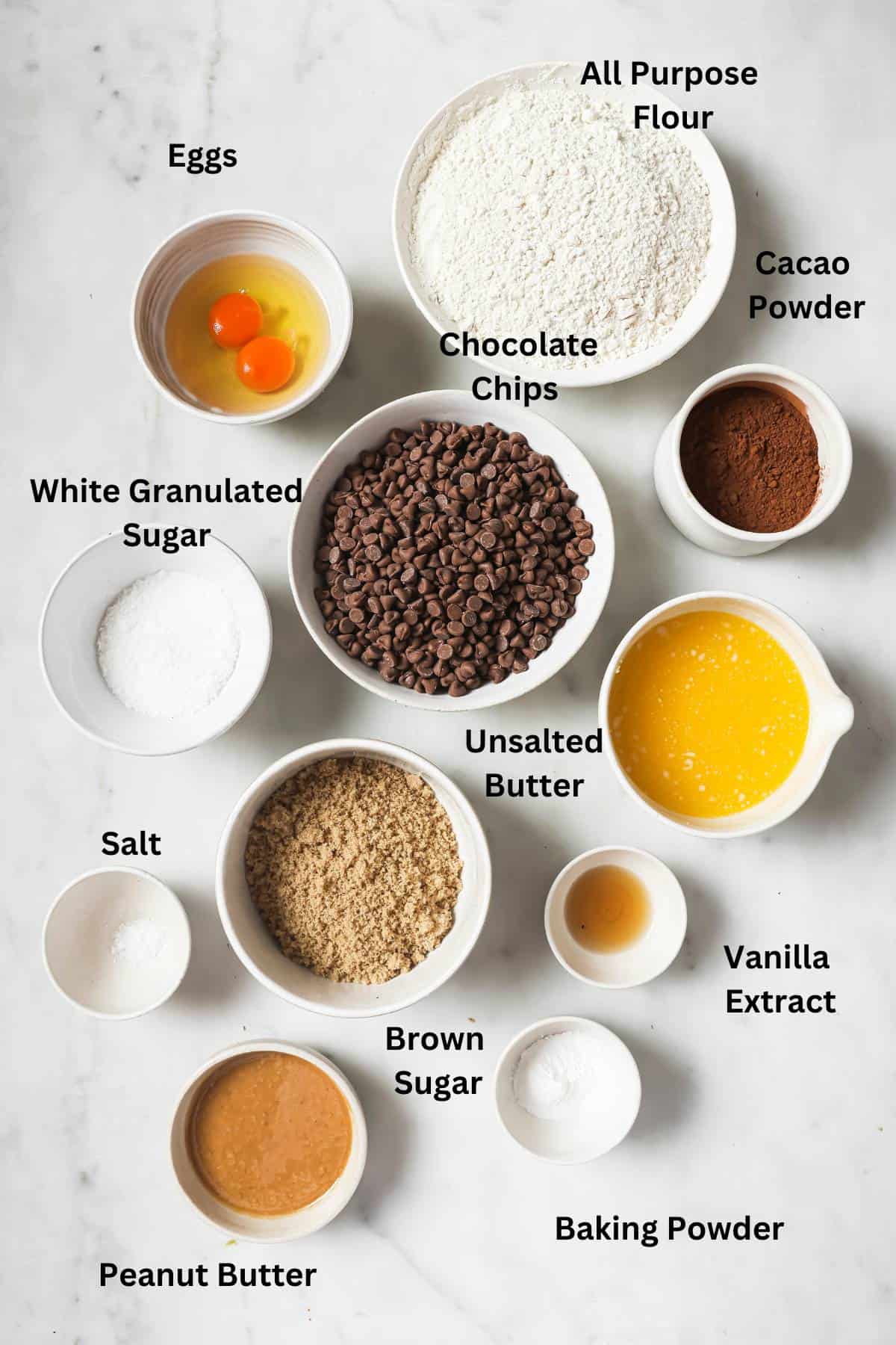 Ingredients to make this recipe recipe on a white counter in white bowls.