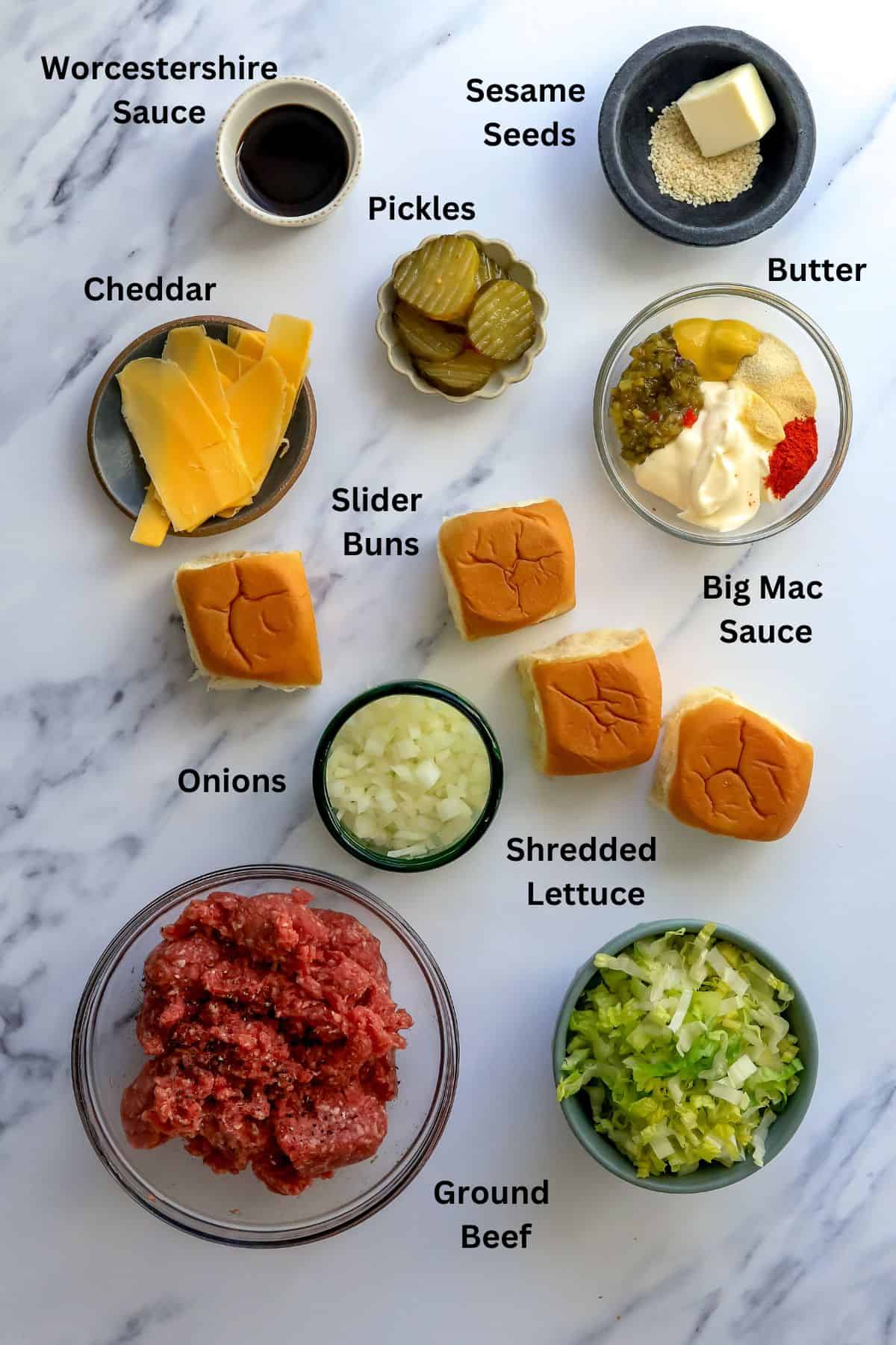 Ingredients needed to make this recipe on a counter in bowls and on small plates. 