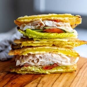 Viral cheese and pickle wrap bread stacked on a plate.