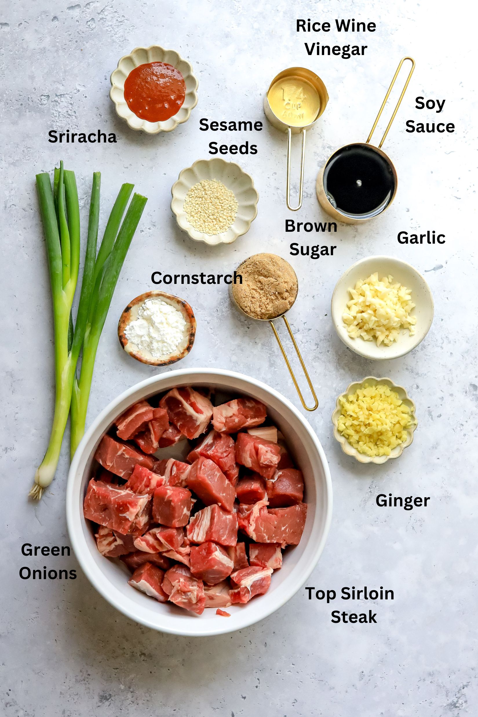 Ingredients needed to make this recipe on a counter in white small bowls.