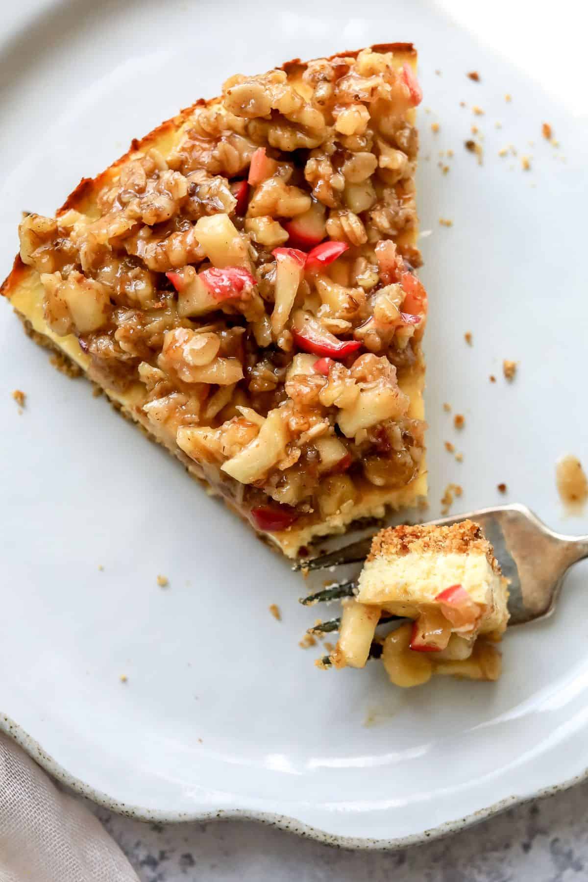 Cottage Cheese Cheesecake on a white plate with a fork on it. 
