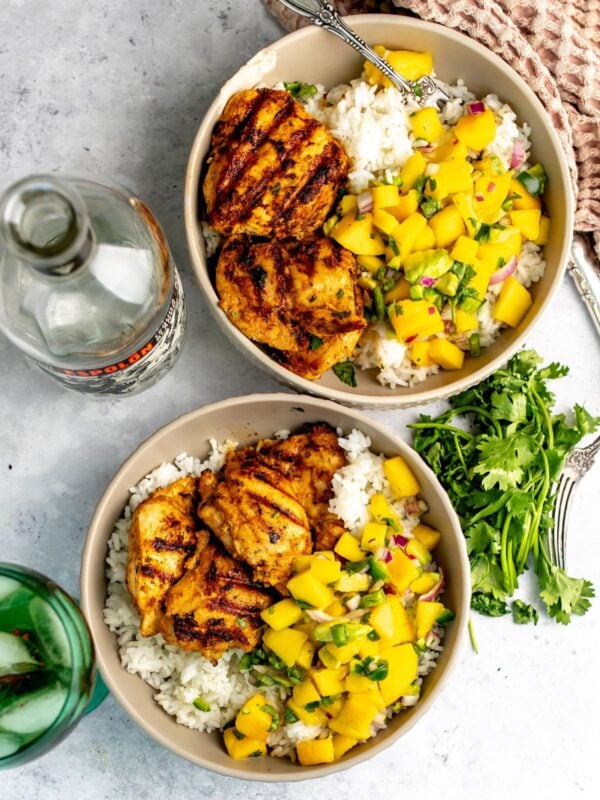 Tequila lime chicken served over rice and with mango salsa.
