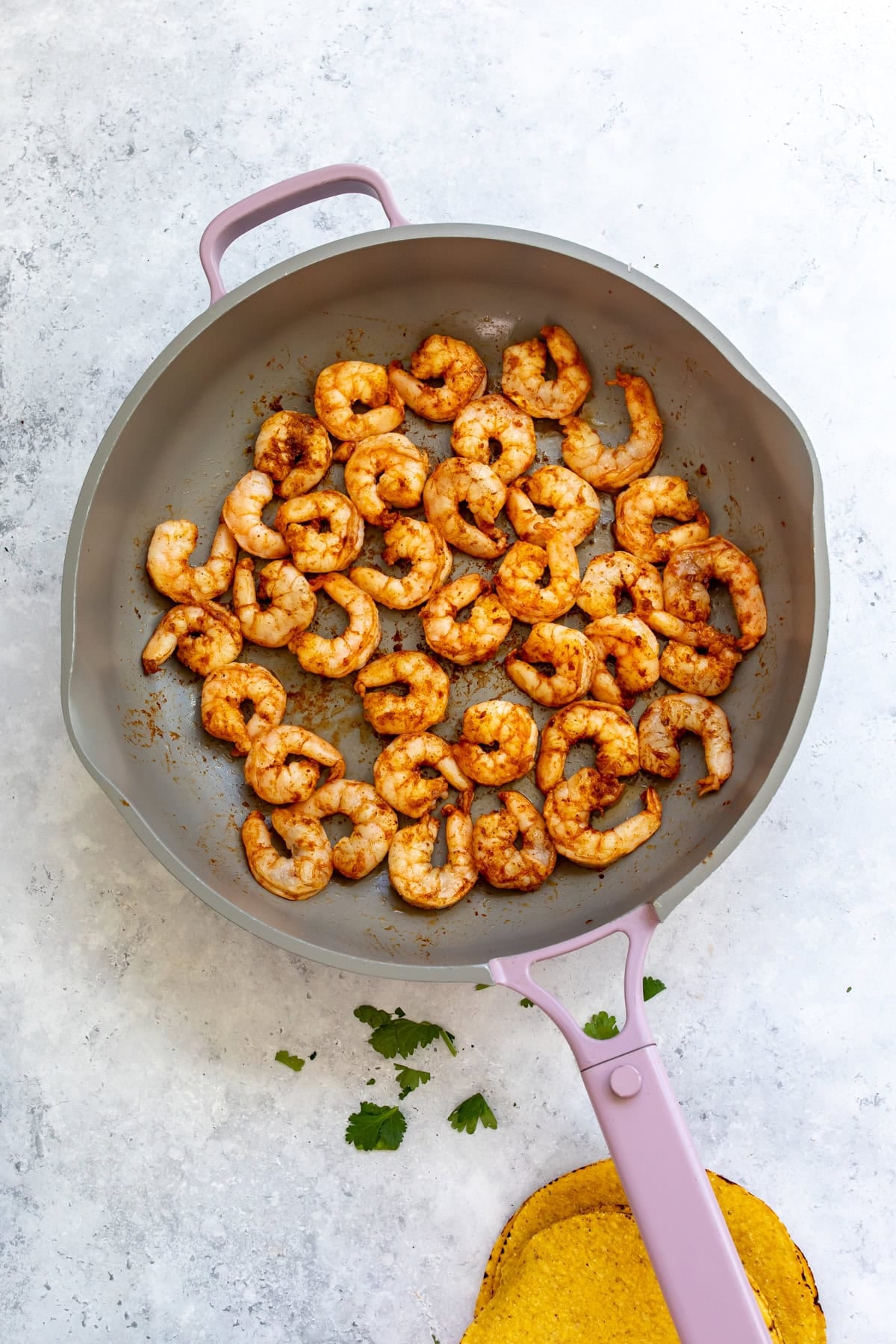 The shrimp cooked in the skillet.